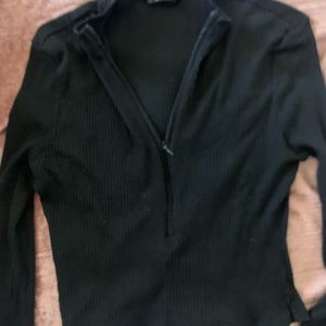 black zip up shirt
